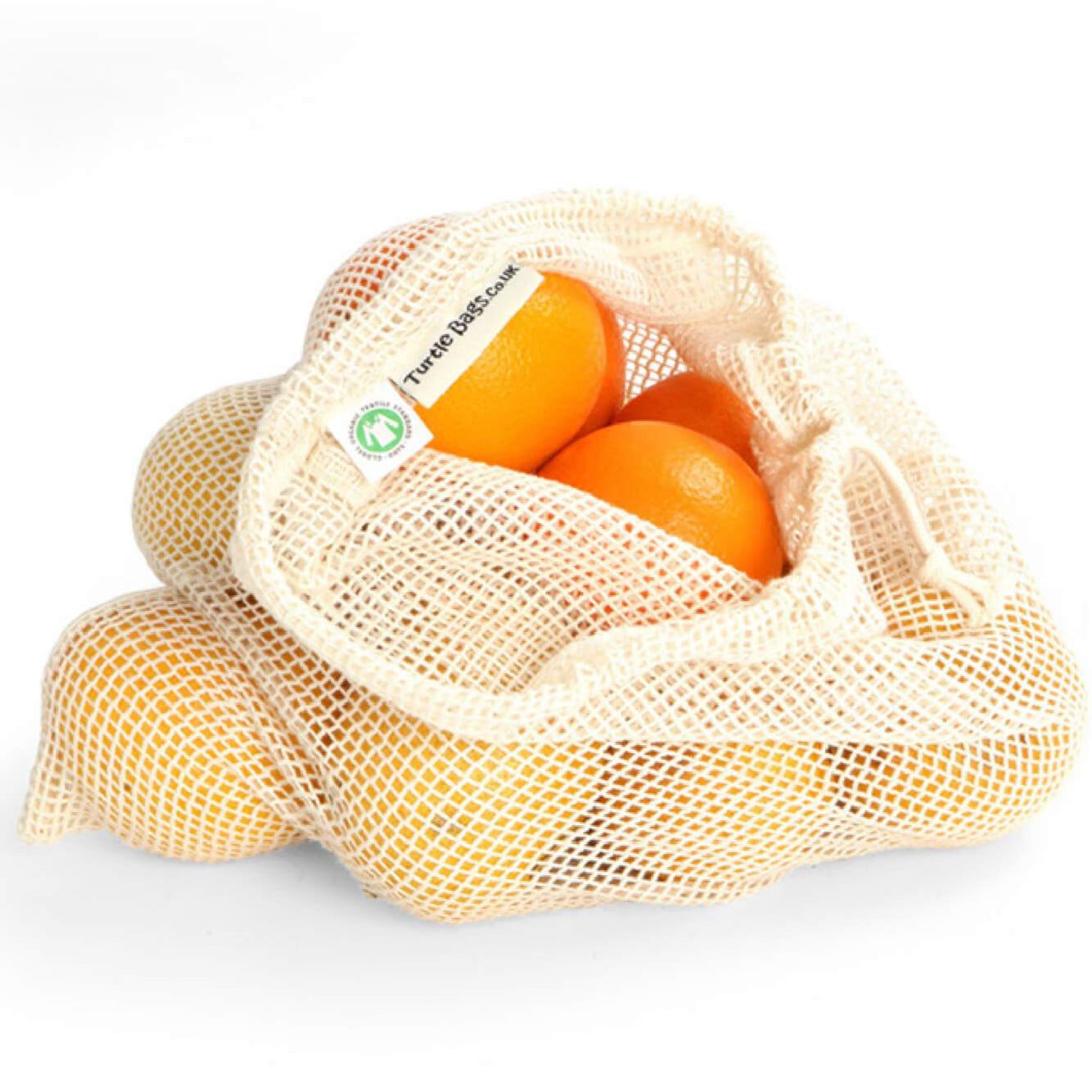 Large bulk produce bag with oranges inside