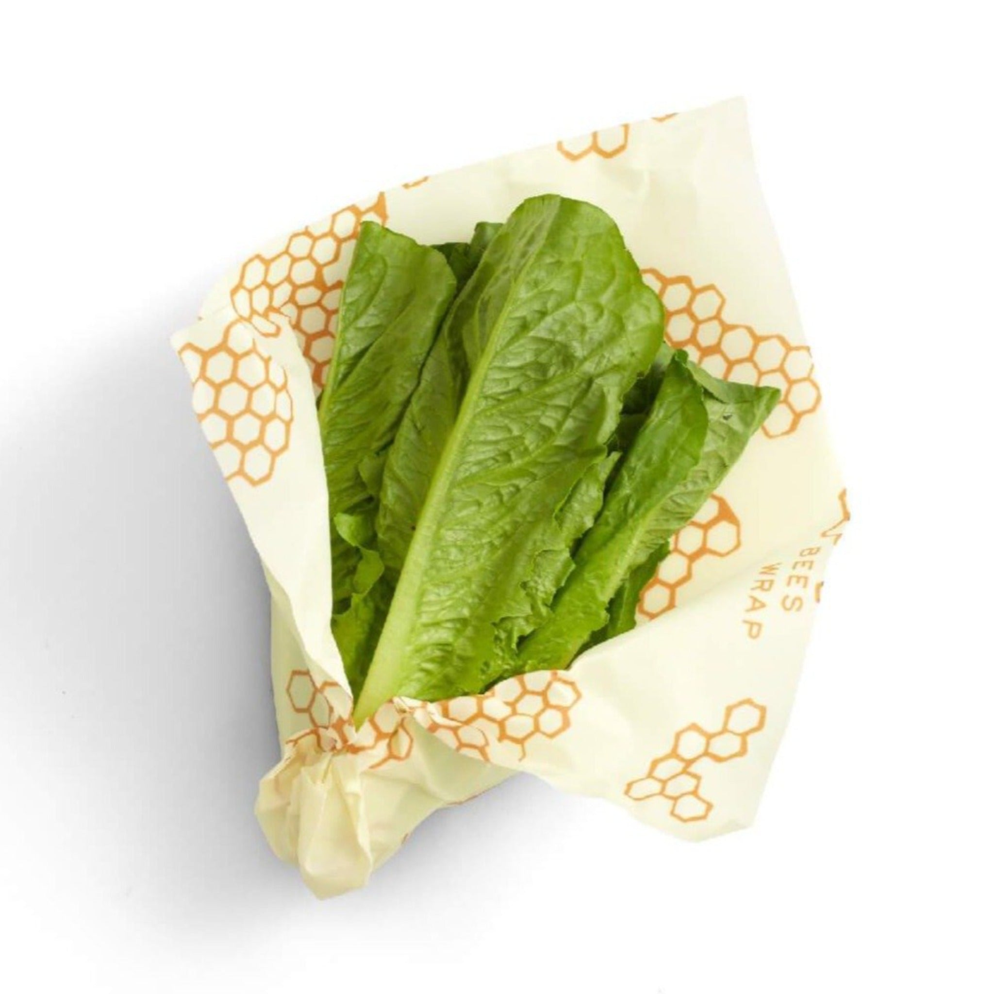 beeswax wrap in use overing lettuce vegetable